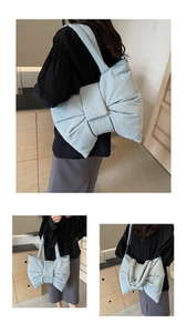 Detailed views of light blue nylon tote bag with large bow and wide shoulder strap