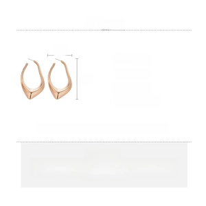 Detail showing irregular rose gold hollow earrings with 7x4cm size and silver needle specs