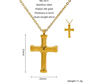 Detail view of 18K gold plated stainless steel cross pendant with 31x22mm dimensions