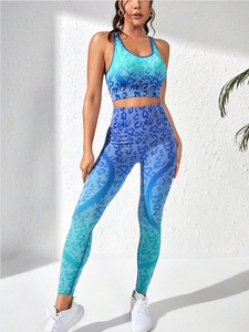 Detail of gradient leopard print seamless yoga set with breathable knit fabric texture