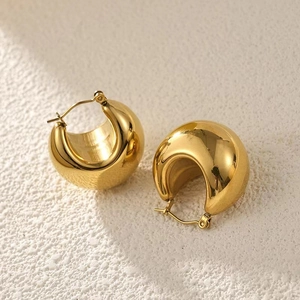Elegant polished golden hollow drop earrings with a sleek minimalist geometric design