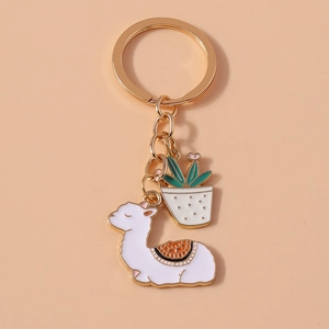 Alpaca and cactus potted plant metal keychain with gold finish and enamel charms