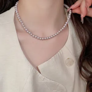 Elegant single strand light purple pearl necklace with 6-8mm round beads on model