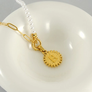 Titanium steel pearl necklace with OT clasp and letter B pendant in gold finish