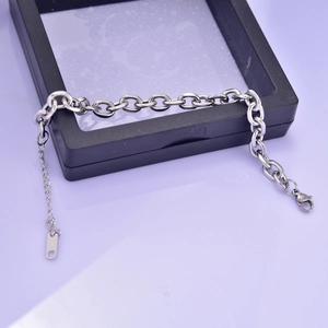 Close-up of geometric silver titanium steel chain bracelet with adjustable lobster clasp