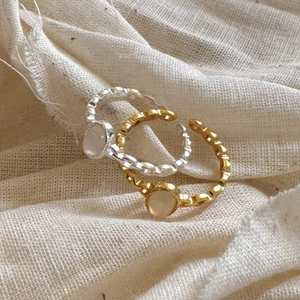 Handcrafted S925 silver and gold open rings set with translucent white crystals