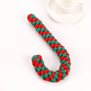 Detailed view of red and green cotton rope candy cane dog toy for dental cleaning