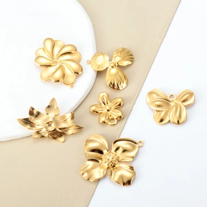 Polished 18k gold plated titanium steel flower and leaf charms for DIY jewelry making