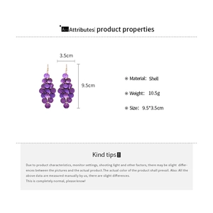 Detail view showing purple shell layers and 9.5cm length of bohemian drop earrings