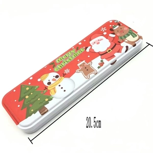 Detailed view of a red Merry Christmas tin stationery box with 20.5cm length marking