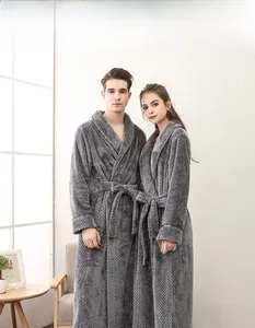Detail showing plush grey waffle texture and belt closure on flannel couple robes