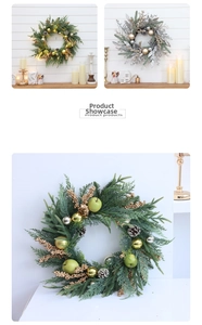 Detail of Christmas wreath with pine needles, golden balls, apples and pinecones