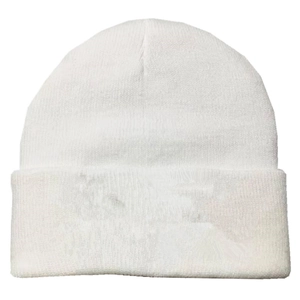Close-up detail of the classic white knitted beanie hat with high-quality ribbed texture