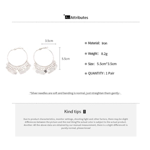 Detailed view of hoop earrings with metal sequins showing dimensions 5.5cm by 3.5cm