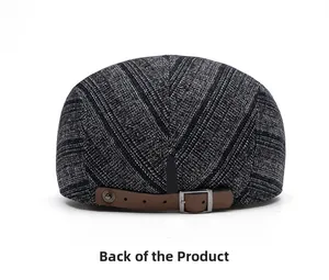 Rear view of vintage herringbone flat cap with adjustable brown leather back strap