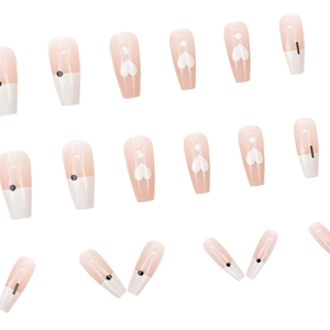 French style long coffin press-on nails in nude pink and white with heart patterns
