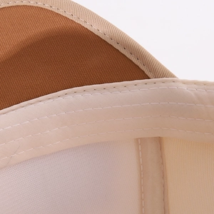 Detailed close-up of reinforced stitching and cotton sweatband inside the baby baseball cap