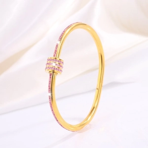Elegant gold titanium steel bangle with three rows of pink sparkling zircons