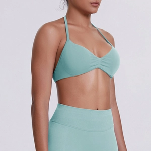 Close-up of mint green high-elastic seamless sports bra and yoga leggings set