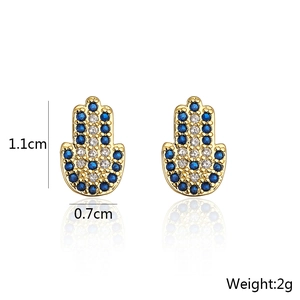 Detail of Hamsa Hand stud earrings in gold with blue and white zircons and size specs