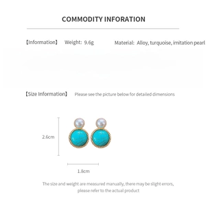 Detail view of gold earrings with turquoise and pearl including dimensions and materials