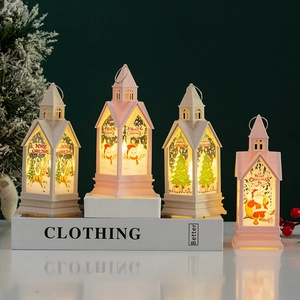 Detail of vintage Christmas lanterns with Santa and snowman patterns on a dark background