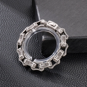 Detailed macro view of vintage totem pattern on 304 stainless steel men's chain bracelet