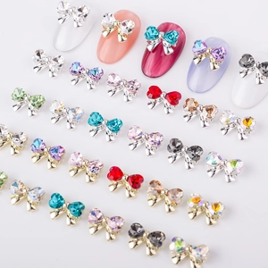 Luxury bow nail charms with colorful rhinestones on gold and silver alloy bases