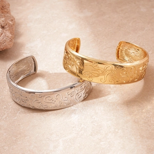 Detailed relief scrolls on gold and silver wide open bangles for women
