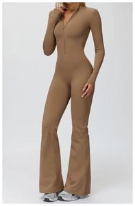 Detail of tan long sleeve jumpsuit featuring half-zip collar and flared yoga pants