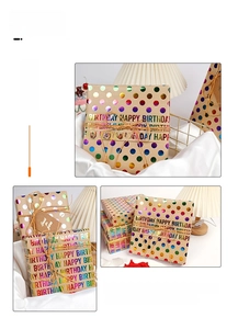 Close-up of kraft wrapping paper with colorful laser dots and Happy Birthday tags