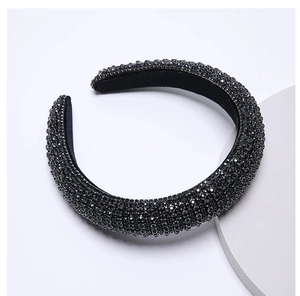 Macro shot of the black velvet headband with sparkling rhinestones and wide thick design