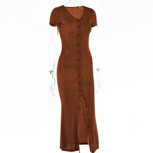 Macro detail of V-neck brown ribbed knit maxi dress with button-front and side slit