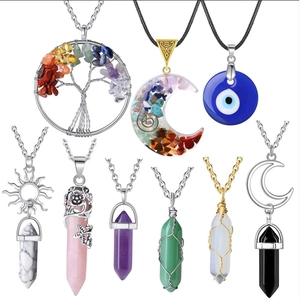 Detailed collection of hexagonal crystal pendants with Tree of Life and Moon resin charms