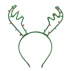 Close-up of Christmas reindeer headband with green tinsel antlers and red bells