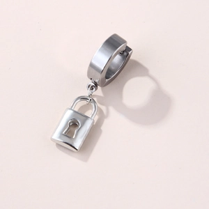 Macro shot of silver stainless steel ear hoop featuring a sleek metal lock pendant