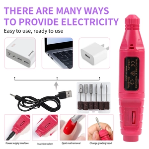 Kit ponceuse à ongles électrique rose avec embouts métalliques et câble d'alimentation USB