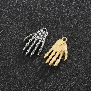 Vintage stainless steel skeleton hand pendants in silver and gold finishes for jewelry DIY
