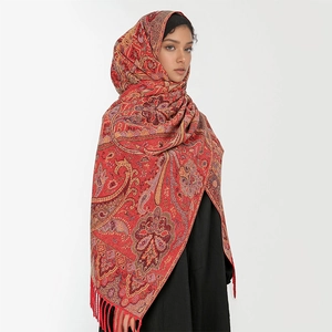 Luxurious red paisley pattern core yarn scarf with decorative fringes for winter