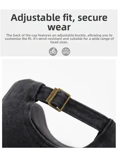 Detail of adjustable metal buckle and washed cotton fabric on baseball cap back