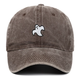 Close-up of white ghost embroidery on dark brown washed cotton baseball cap texture