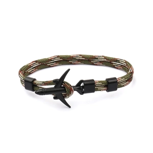 Green camouflage parachute cord bracelet with a black airplane metal pendant for couples