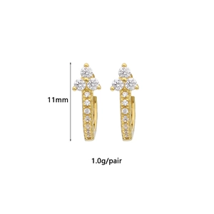 Macro shot showing 11mm gold ear hoops with cubic zirconia stones weighing 1.0g