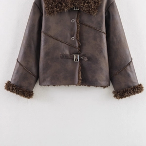Faux shearling lined jacket in dark brown leather with cozy plush collar and metal buckles