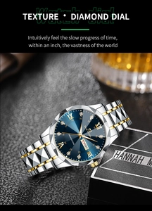 Detail of luxury men's watch featuring a blue diamond dial and two-tone metal strap