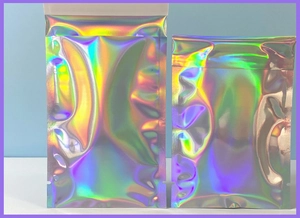 Detailed view of holographic stand-up pouches with rainbow metallic finish and seal