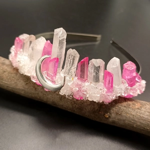 Pink and white natural crystal crown headband with silver crescent moon charm on wood