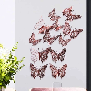 Detailed view of 3D rose gold hollow butterfly wall stickers with intricate lace patterns
