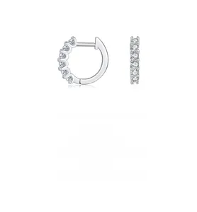 Close-up of S925 silver hoop earrings with pave-set moissanite round-cut stones