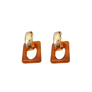 Minimalist geometric square acrylic earrings in orange with gold metallic clasp